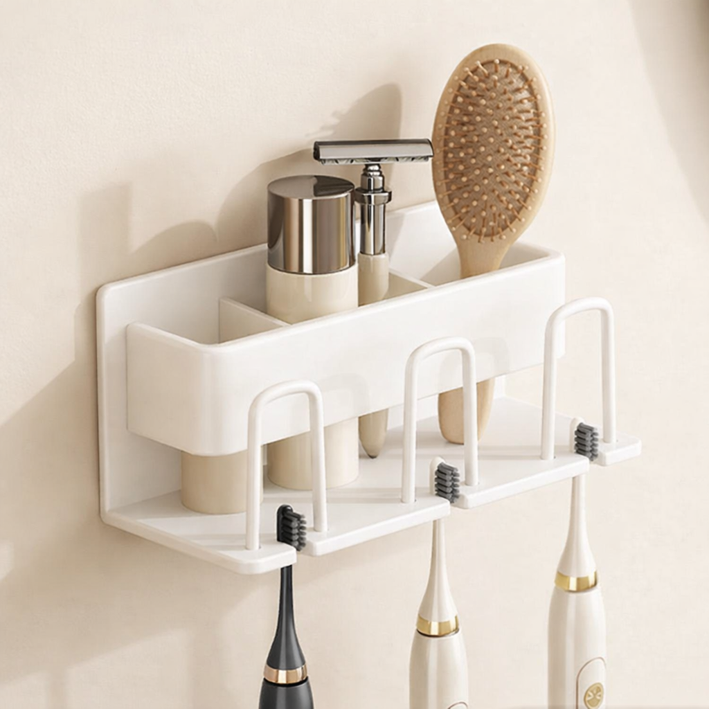 Wall-mounted bathroom organizer with toothbrushes, bottles, and a hairbrush on a beige wall.