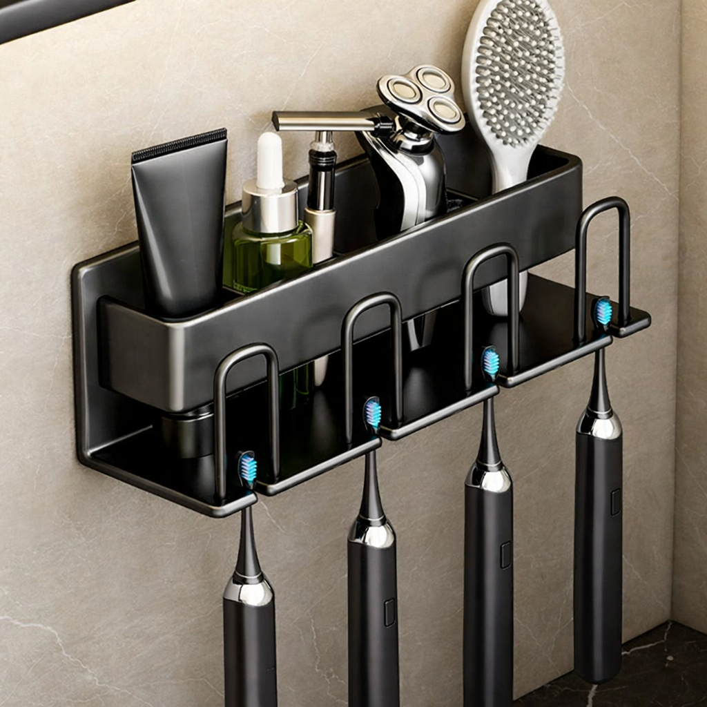 Bathroom shelf with toiletries and electric toothbrushes on a tiled wall.
