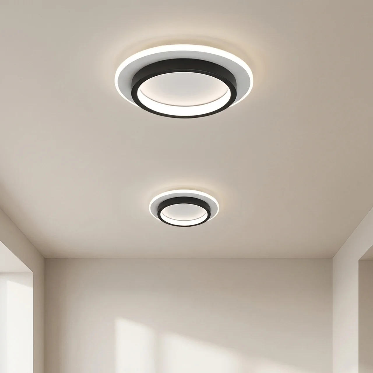 Two modern ceiling lights on a neutral ceiling